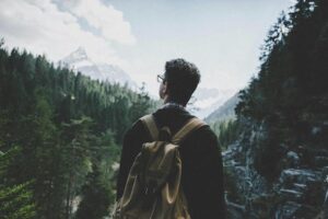 man on a hike in the mountains