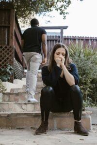 couple having an argument and walking away