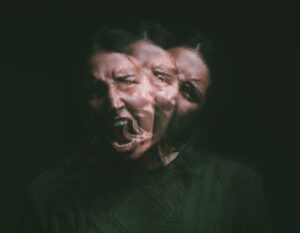 Blurred image of female screaming